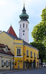 Fototapeta na wymiar Church and old houses in Grinzing Vienna Austria