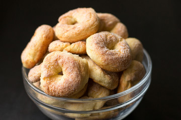 Homemade cookies. Cottage cheese rings on a dark background, healthy sweets. Bake at home. Family traditions. Selective focus