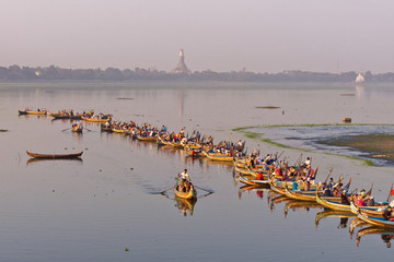 Boats on Taung Tha Man Lake While Sunset Near U-Bein Bridge, Amarapura, Mandalay, Myanmar, Asia