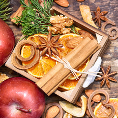 Rustic Christmas background with dry orange