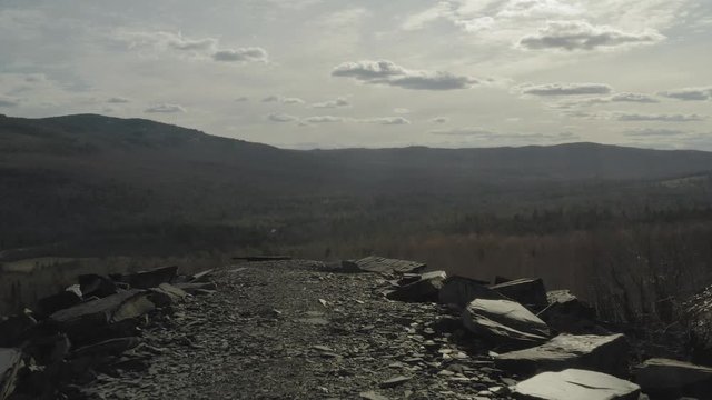 Wide aerial over slate quarry Monson, Maine 