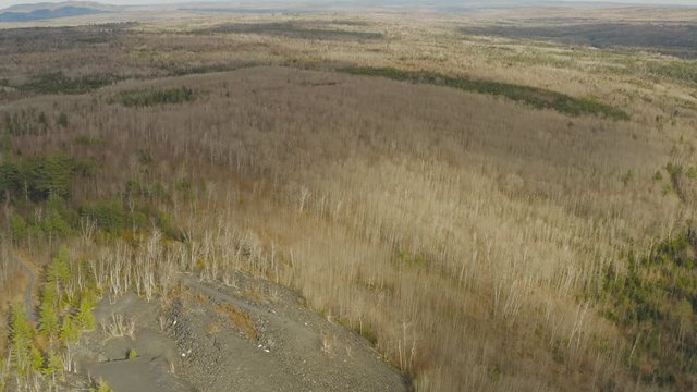 Aerial view of abandoned slate quarry reveal vast wooden landscape Monson, Maine  