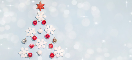 Merry Christmas and Happy New Year, Holidays greeting card with blurred bokeh background