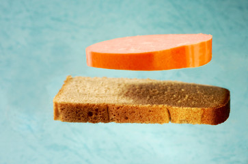 Sausage sandwich on a blue background. Concept
levitation         