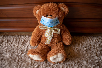 Teddy bear in mask