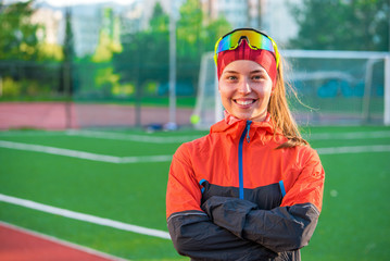 Young girl is training. Girl run. Running track. Sport. Healthy lifestyle.  