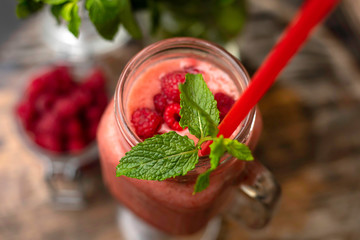 smoothies with berries on a wooden table
