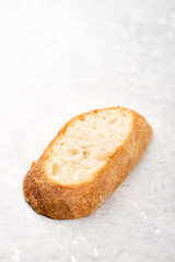 slice of bread on a grey marble table
