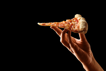 Hand holding slice of cheese pizza cut in slices - Powered by Adobe