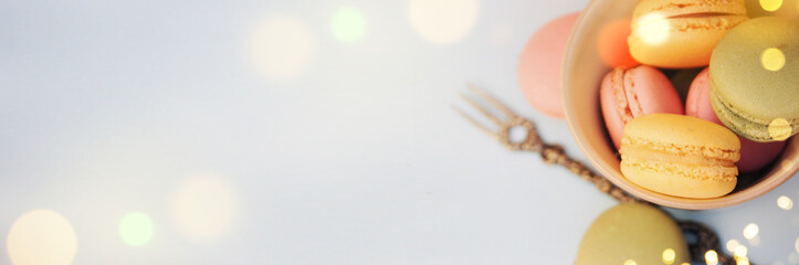 Spring background with blossom and macaroon