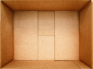 Open box for things. Empty open cardboard box close-up. Packing for cargo. - obrazy, fototapety, plakaty