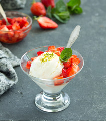 Ice cream with strawberry sauce. Selective focus