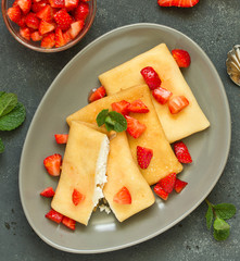 Pancakes with cottage cheese with strawberries. Selective focus