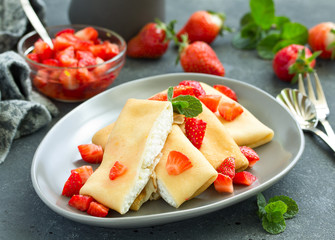 Pancakes with cottage cheese with strawberries. Selective focus