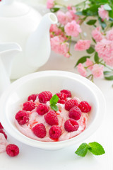 Creamy curd mousse with raspberries. Healthy breakfast.