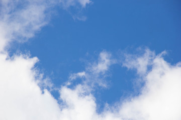 Blue sky with clouds. White cloud. Blue background