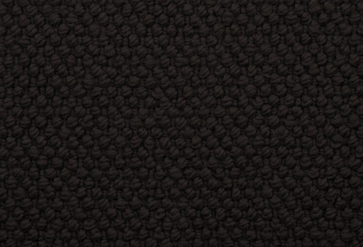 Seamless black 'loopback' style carpet background texture.