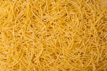 Photo of beautiful tiny asian dry pasta background, bio food