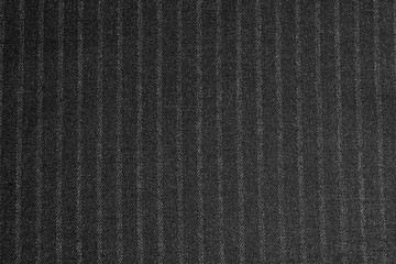 Texture of dark striped fabric as background, closeup