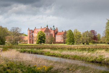 The historic Gammel Estrup Castle in Djursland. Old Estrup, most famous castle of Jutland region, Denmark