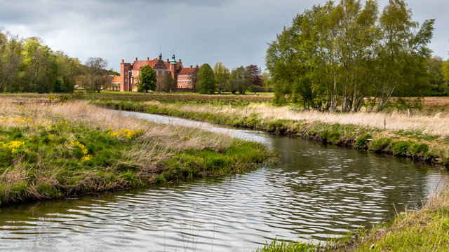 The historic Gammel Estrup Castle in Djursland. Old Estrup, most famous castle of Jutland region, Denmark