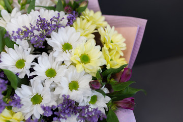 Cheerful colorful bouquet (Colors: white, yellow, green, purple. Chrysanthemums, alstroemeria).