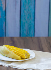 corn on the cob cooked in water with butter