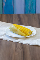 corn on the cob cooked in water with butter