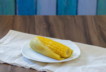 corn on the cob cooked in water with butter
