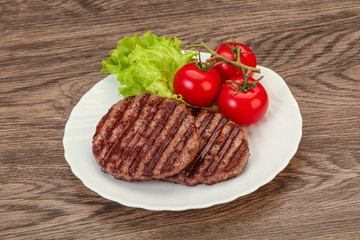 Grilled burger cutlet with sauce