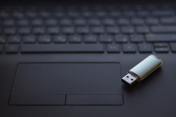 usb flash drive on laptop