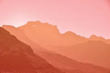 Fotobehang Baksteen Sunset aerial perspective mountain landscape  © breakingthewalls
