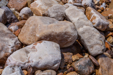 Salt on large sea stones