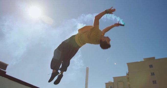 Caucasian men practicing parkour