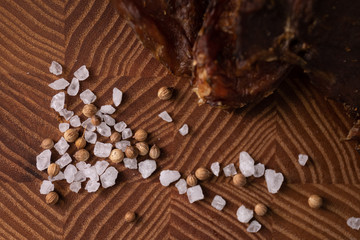 Close-up of a piece of meat on a wooden Board with spices. Restaurant menu, a series of photos of different dishes