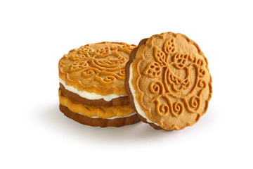 cookies with a layer of milk cream on a white background