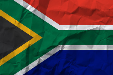 National flag South Africa on crumpled paper.