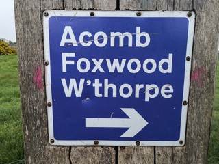 Direction sign Acomb Foxwood Woodthorpe York UK