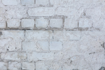 Wall with silicate brick aged with crashed plaster