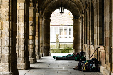 tired pilgrim in compostela old town