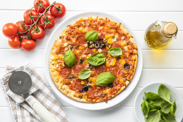Tasty salami pizza.