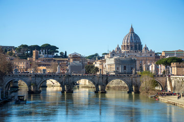 Fototapeta na wymiar View to St. Peter cathedral of Vatican from the Umberto I bridge, Rome, Italy