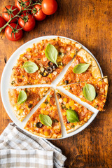 Tasty salami pizza.