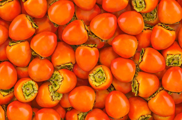 Background from persimmons, top view. 3D rendering