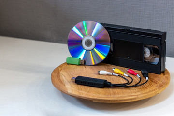 digitization of video tapes, recording to a USB flash drive and a disc on a wooden stand