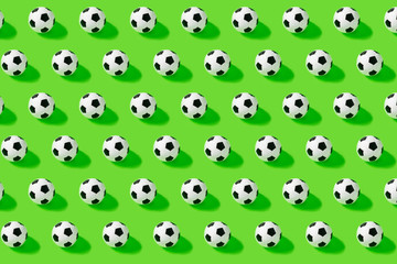 Pattern. Soccer ball on green backgraund. Game, match