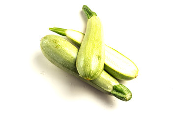 Fresh vegetable zucchini. Isolated on a white background. Squash. Dietary product. Of natural vegetables.