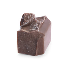 Piece of milk chocolate isolated on white