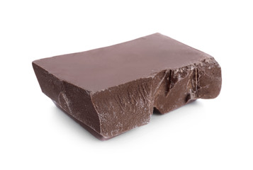 Piece of milk chocolate isolated on white