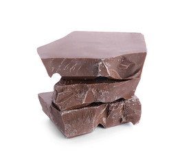 Pieces of milk chocolate isolated on white